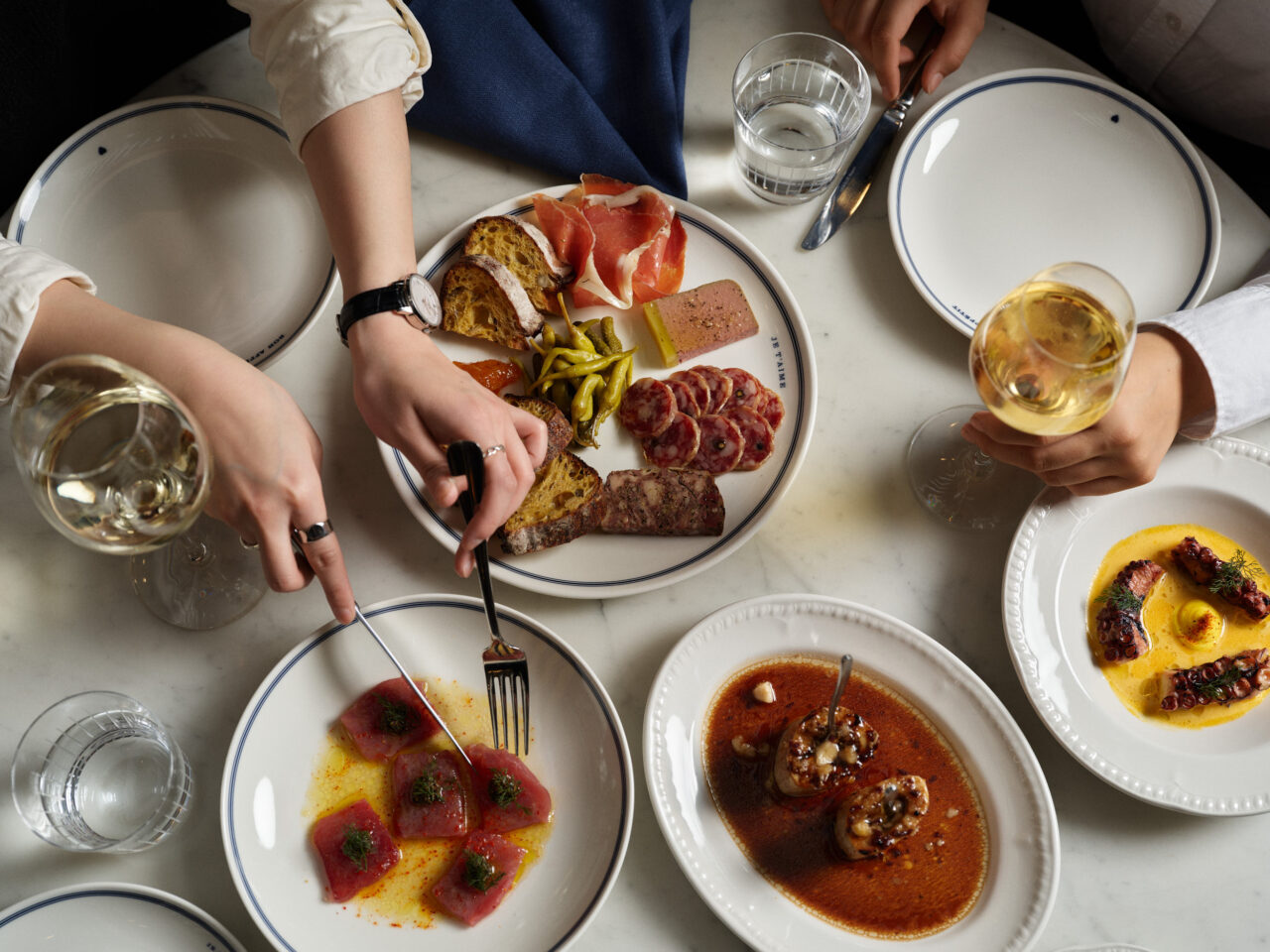Shared French bistro dishes and wine at Loulou Martin Place